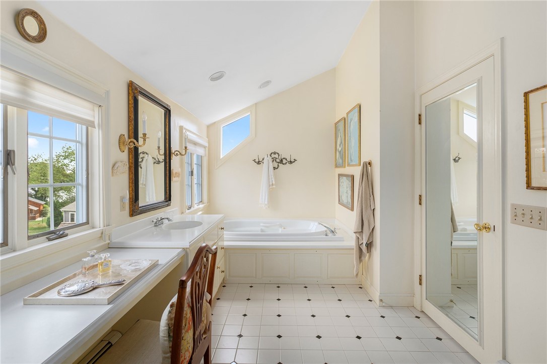 34 Decatur Avenue Jamestown, RI 02835 - Photo 26 of 40 Primary bathroom two vanities and soaking tub