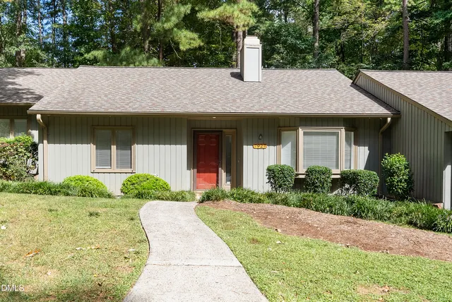 a house view with a garden space