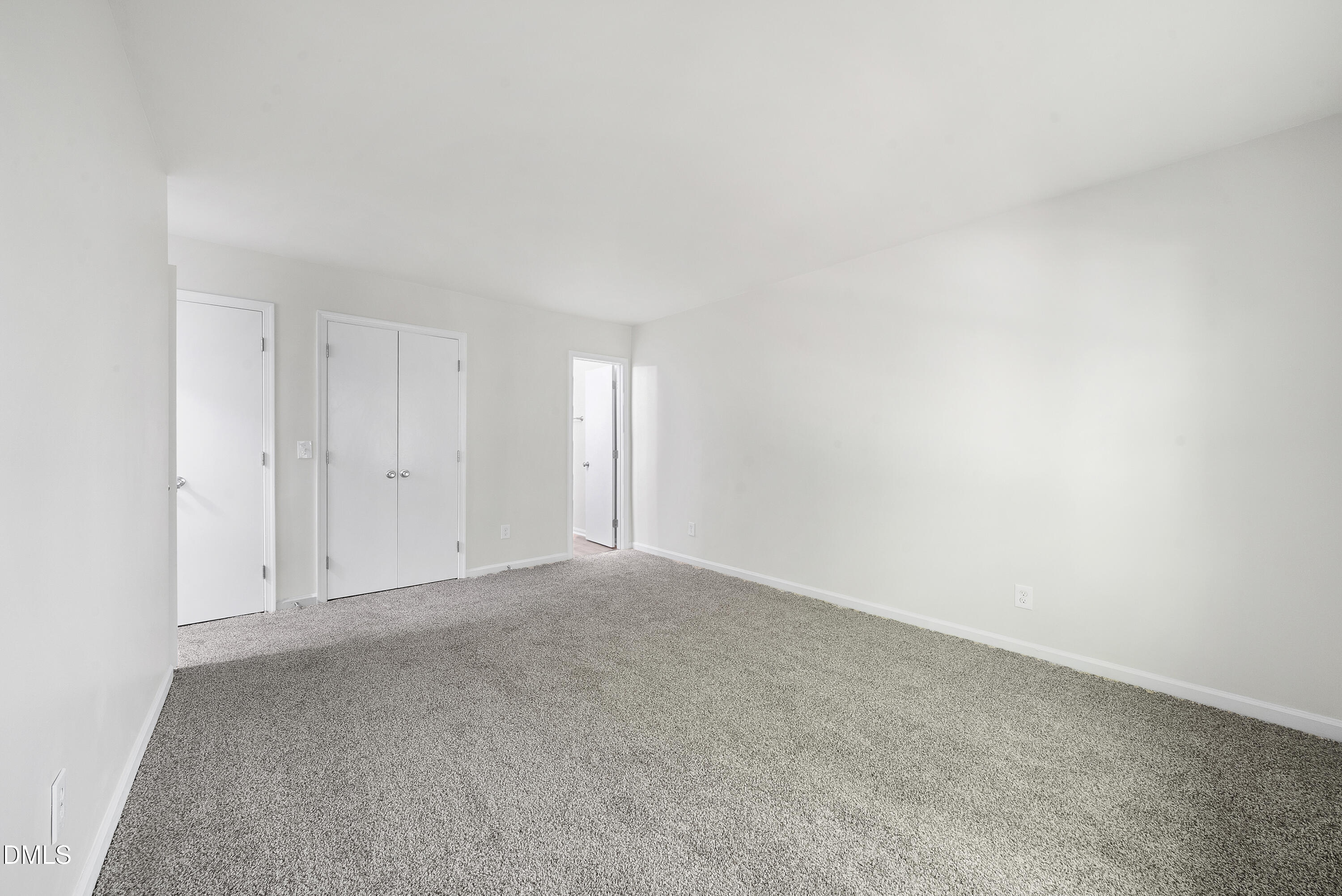 7927 Brown Bark Place Raleigh, NC 27615 - Photo 17 of 25 a view of an empty room and window