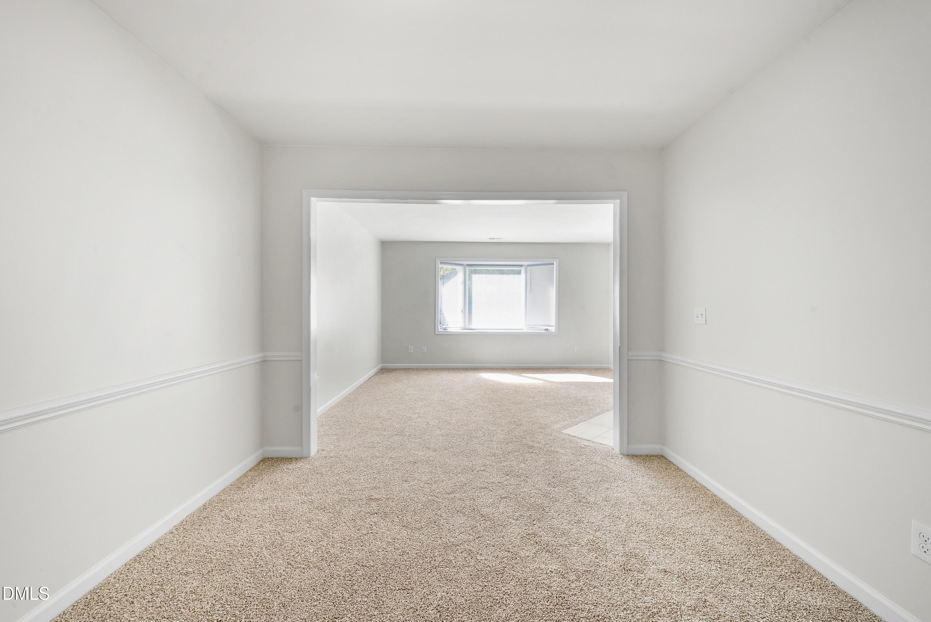 7927 Brown Bark Place Raleigh, NC 27615 - Photo 7 of 25 an empty room with a window