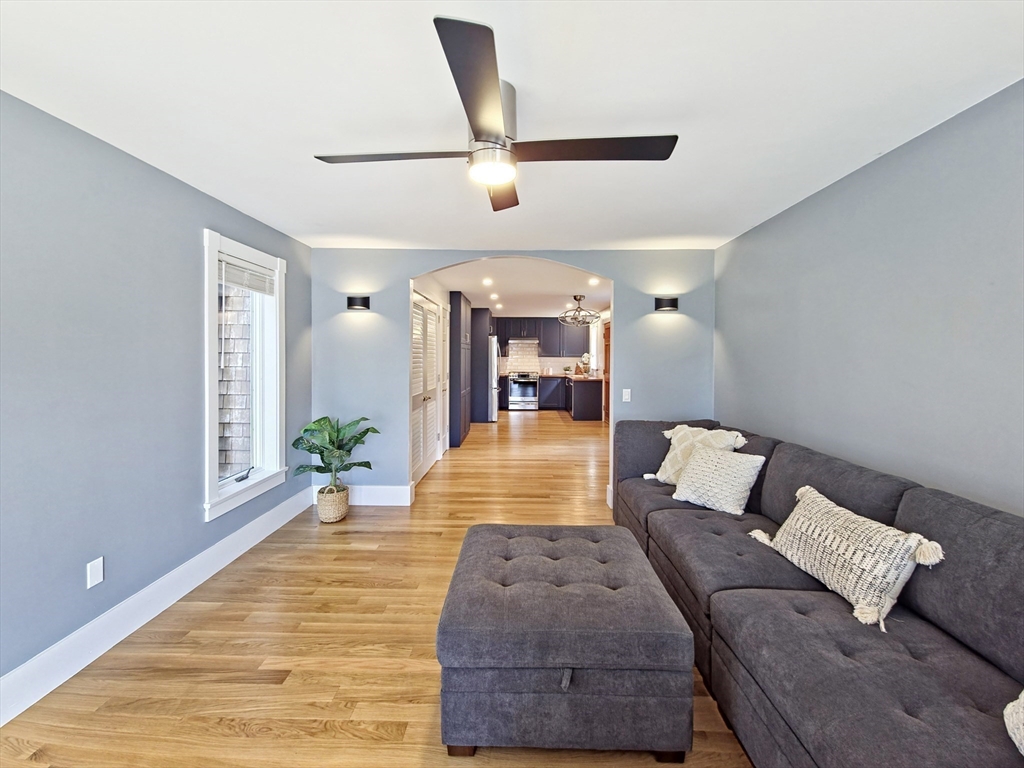 10 Squeteague Harbor Road Bourne, MA 02534 - Photo 13 of 41 a living room with furniture and a wooden floor