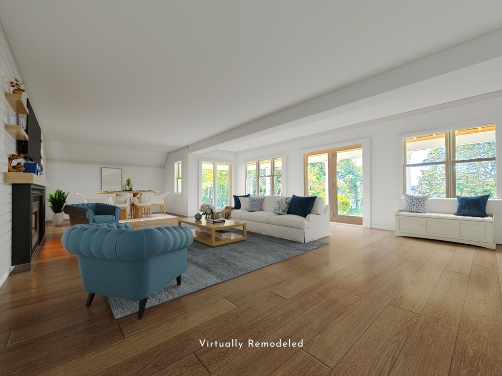 10 Squeteague Harbor Road Bourne, MA 02534 - Photo 18 of 41 a living room with furniture and a large window