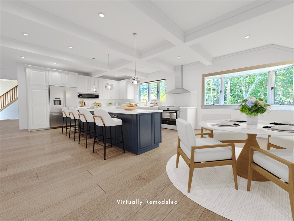 10 Squeteague Harbor Road Bourne, MA 02534 - Photo 20 of 41 a large dining space with furniture a rug and a view