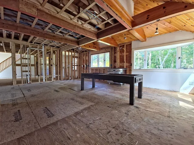 a view of a room with wooden walls