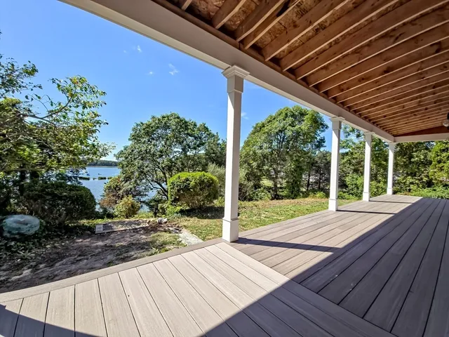 a view of backyard with green space