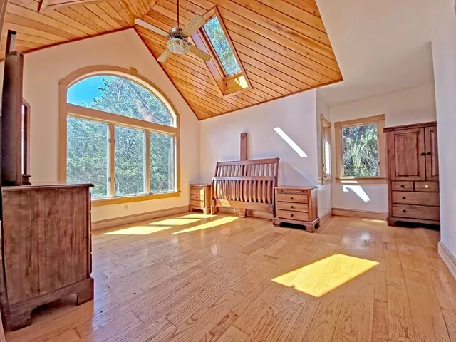 a view of an entryway with a floor to ceiling window
