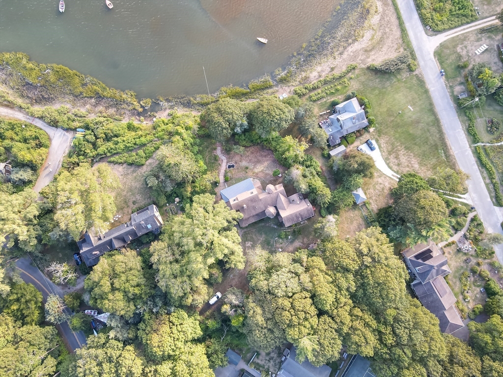 10 Squeteague Harbor Road Bourne, MA 02534 - Photo 37 of 41 a bathroom with a lot of flowers