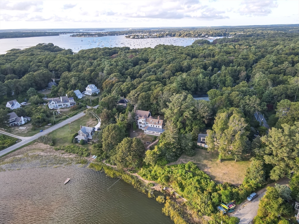 10 Squeteague Harbor Road Bourne, MA 02534 - Photo 39 of 41 an aerial view of green landscape with trees houses and mountain view