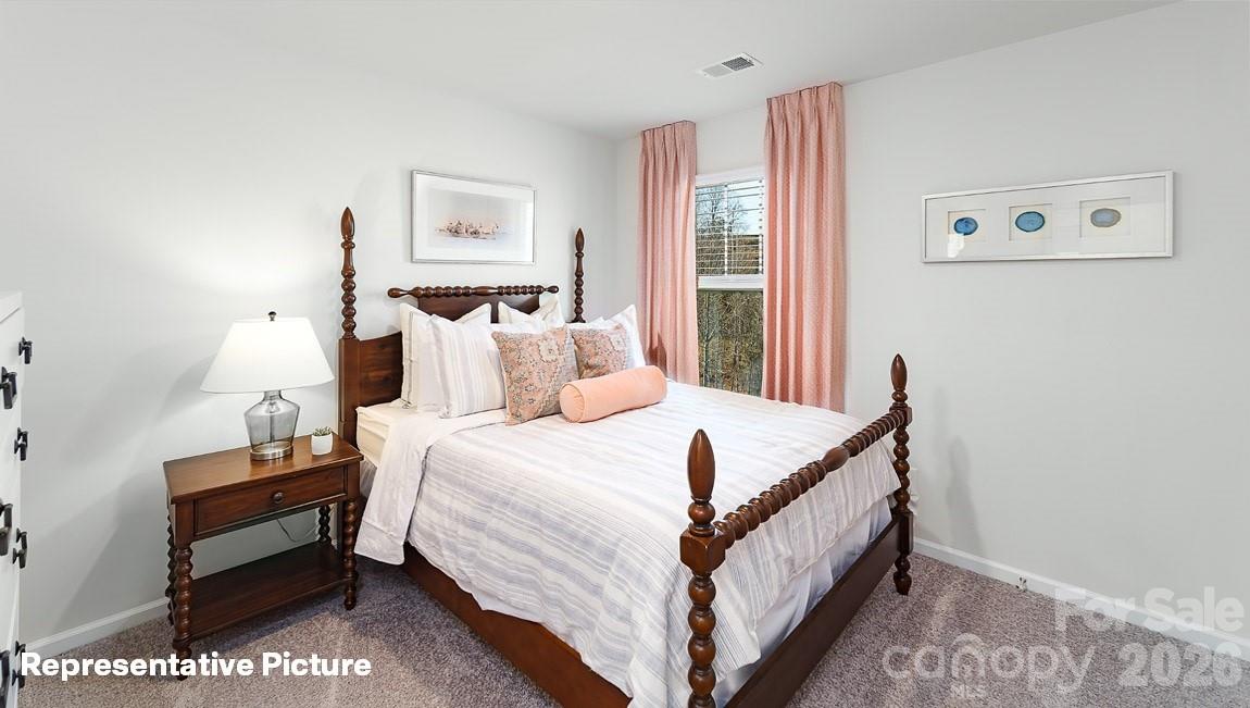 3000 Arundel Court Maiden, NC 28650 - Photo 18 of 35 a bed room with a bed and a window