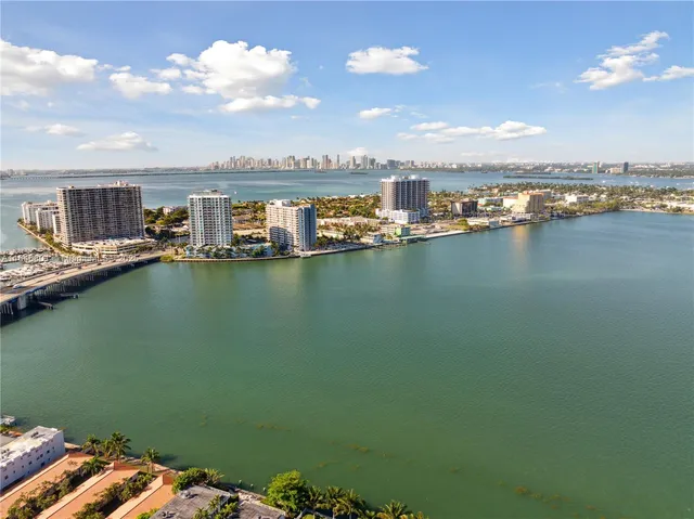 a view of a city with lawn chairs