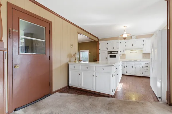 a spacious bathroom with a double vanity sink and a mirror