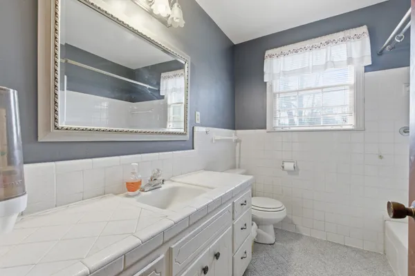 a bathroom with a sink and a toilet