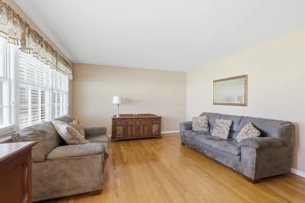 a living room with furniture and a couch