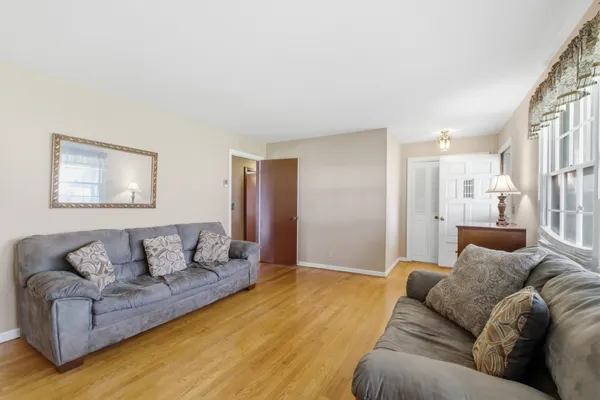 a living room with furniture and a couch