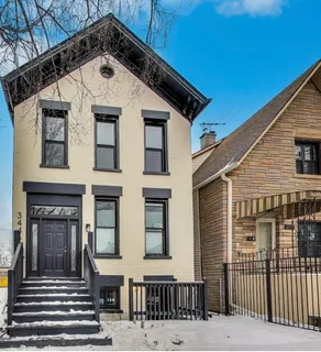 a front view of a house with a door