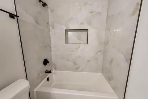 a bathroom with a bathtub