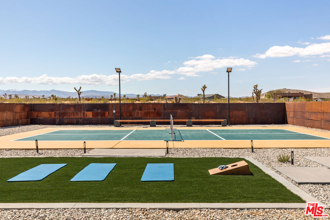 3000 Rockwood Road Joshua Tree, CA 92252 - Photo 67 of 71 a view of a swimming pool with a lake
