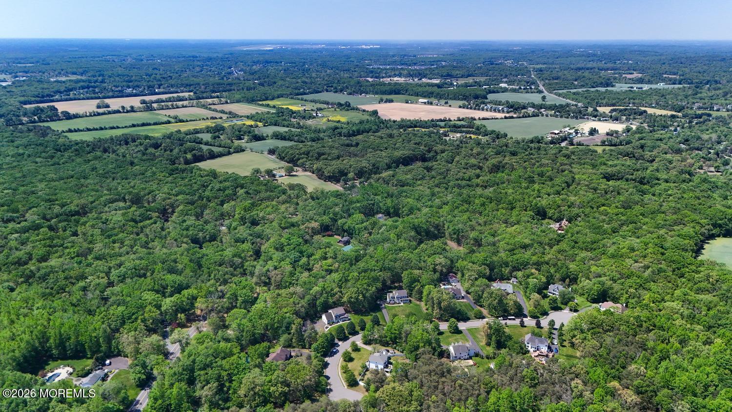 7 Cherry Tree Lane Cream Ridge, NJ 08514 - Photo 42 of 47 a view of a city with tall buildings in the back