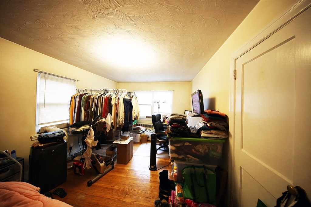 23 Heath Street, Unit 1 Brookline, MA 02445 - Photo 10 of 16 a view of a room with gym equipment