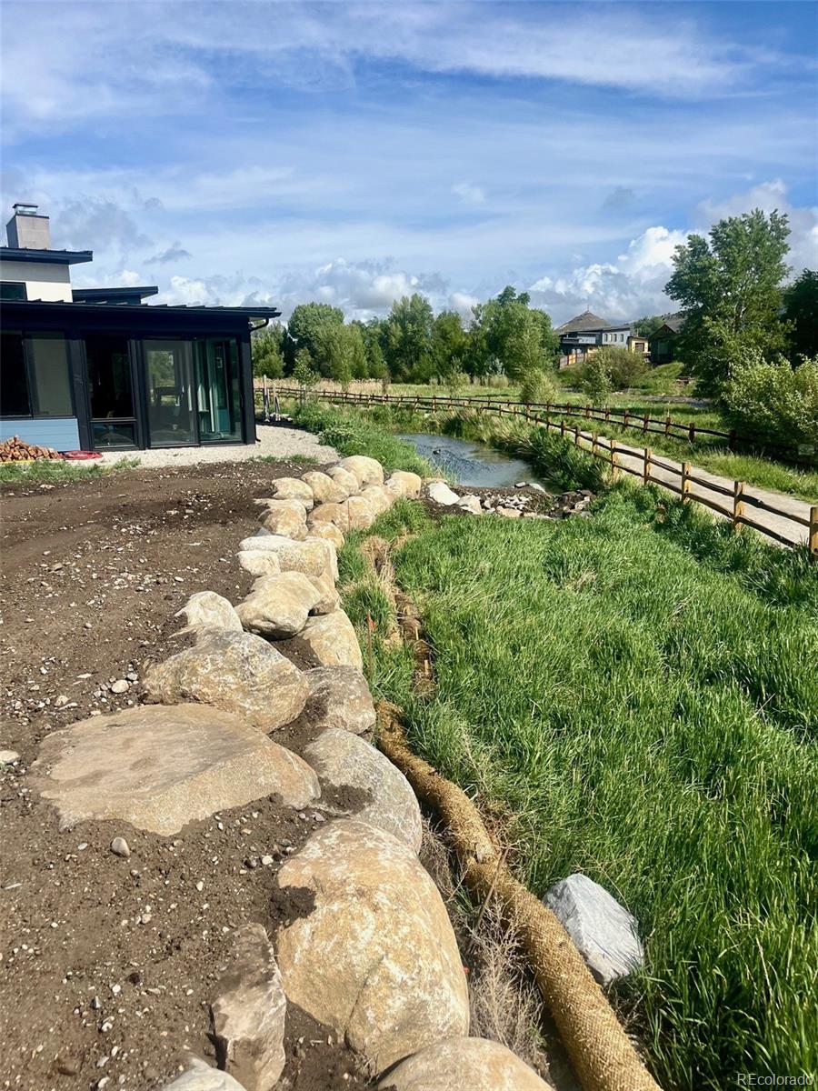 306 Southside Loop Salida, CO 81201 - Photo 15 of 37 a view of a house with a yard