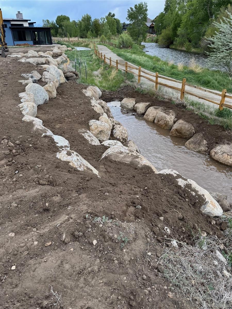 306 Southside Loop Salida, CO 81201 - Photo 16 of 37 a view of a yard with a bench