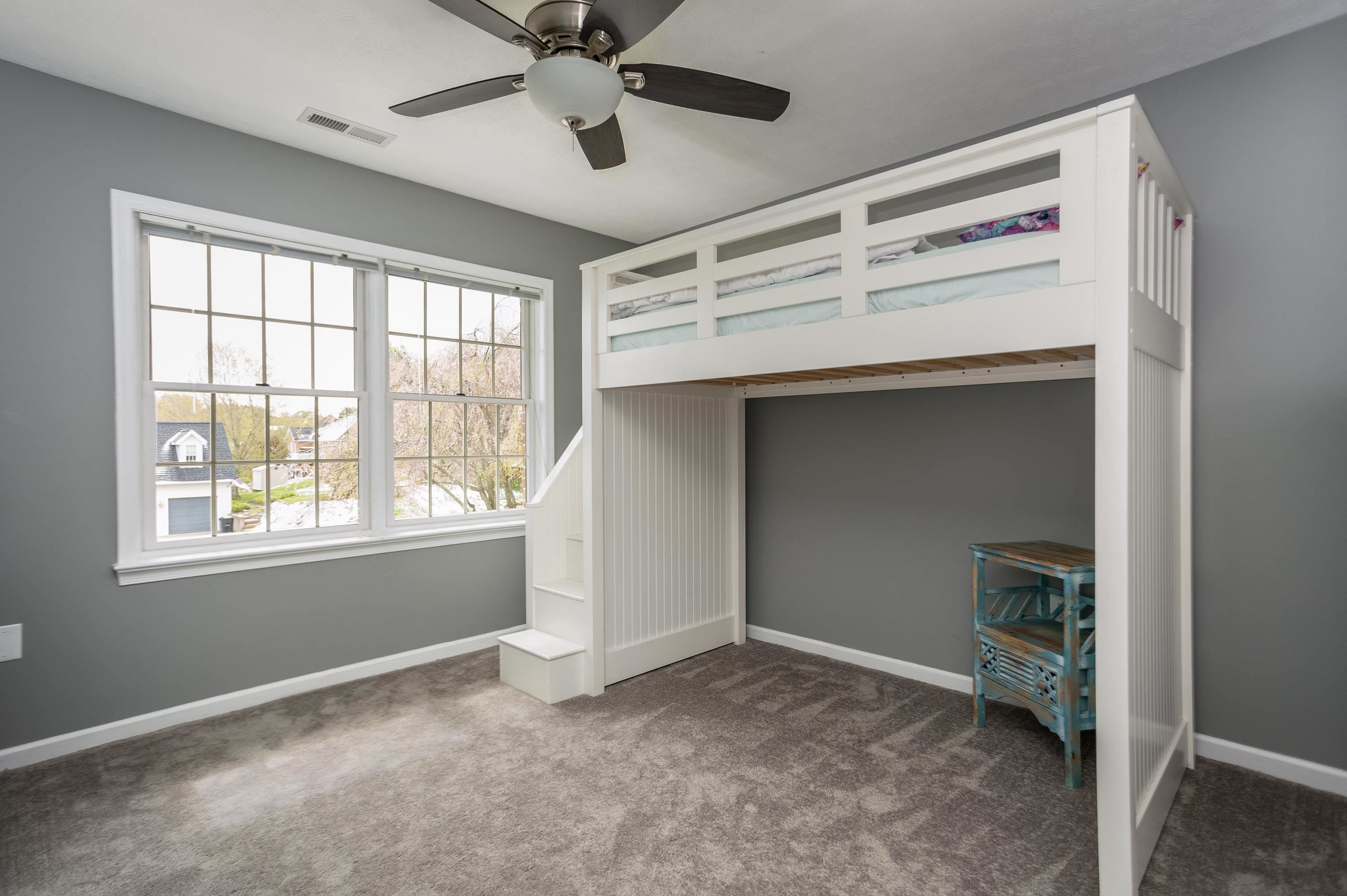 3850 Davis Road Penn Laird, VA 22846 - Photo 34 of 70 an empty room with a ceiling fan and a window