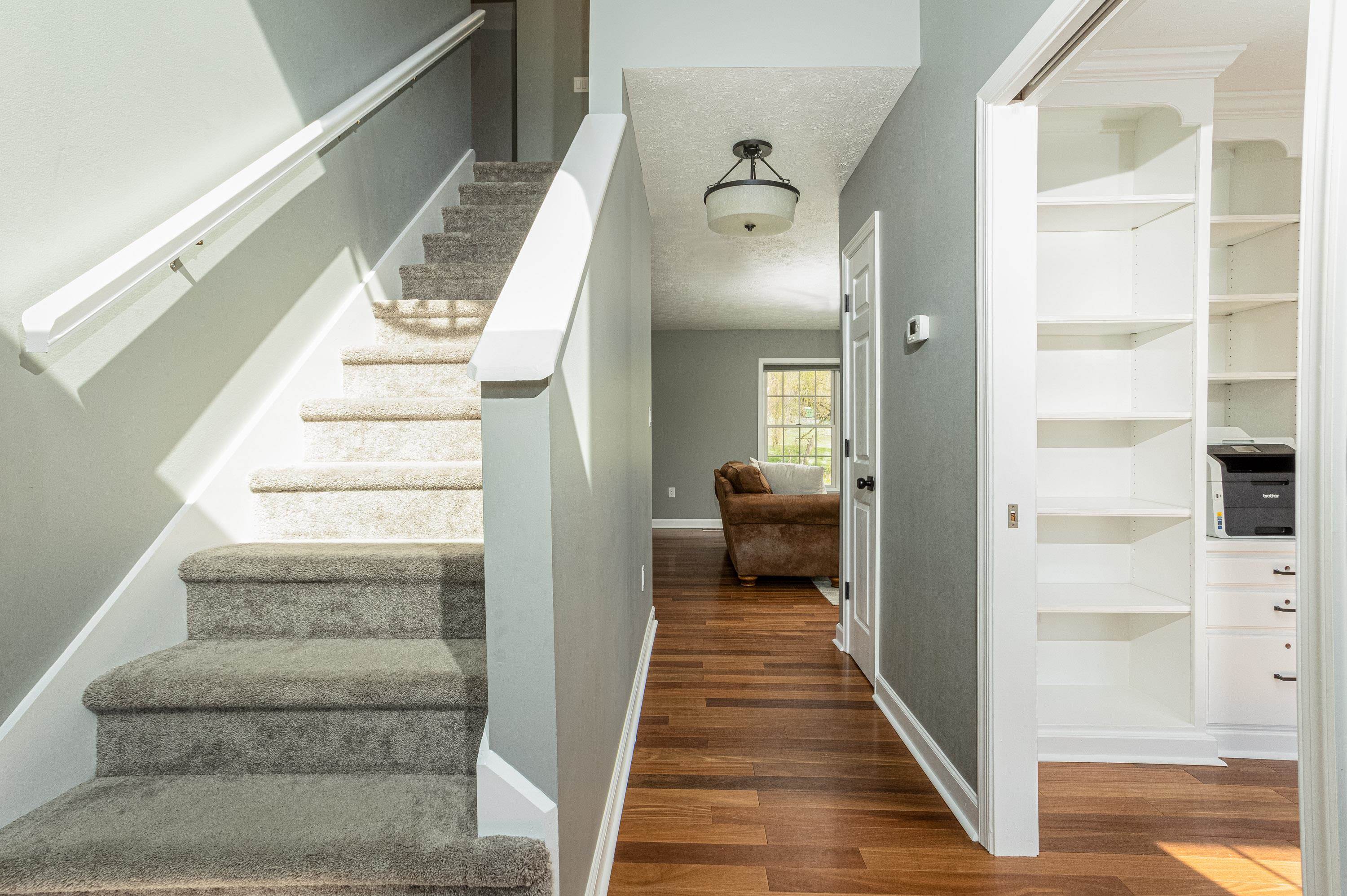 3850 Davis Road Penn Laird, VA 22846 - Photo 4 of 70 a view of a hallway with wooden floor and staircase