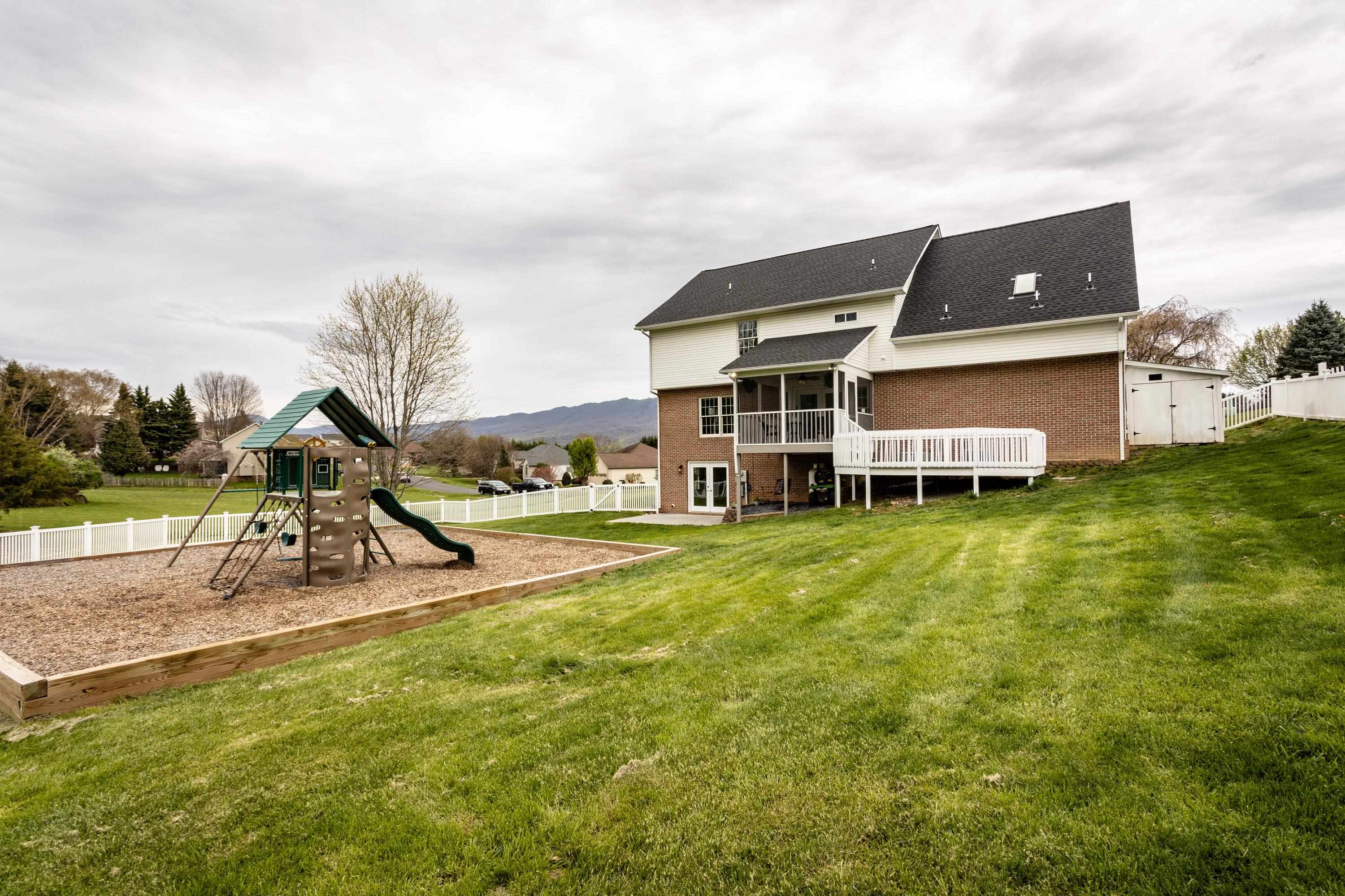 3850 Davis Road Penn Laird, VA 22846 - Photo 49 of 70 a view of a house with a big yard and large trees