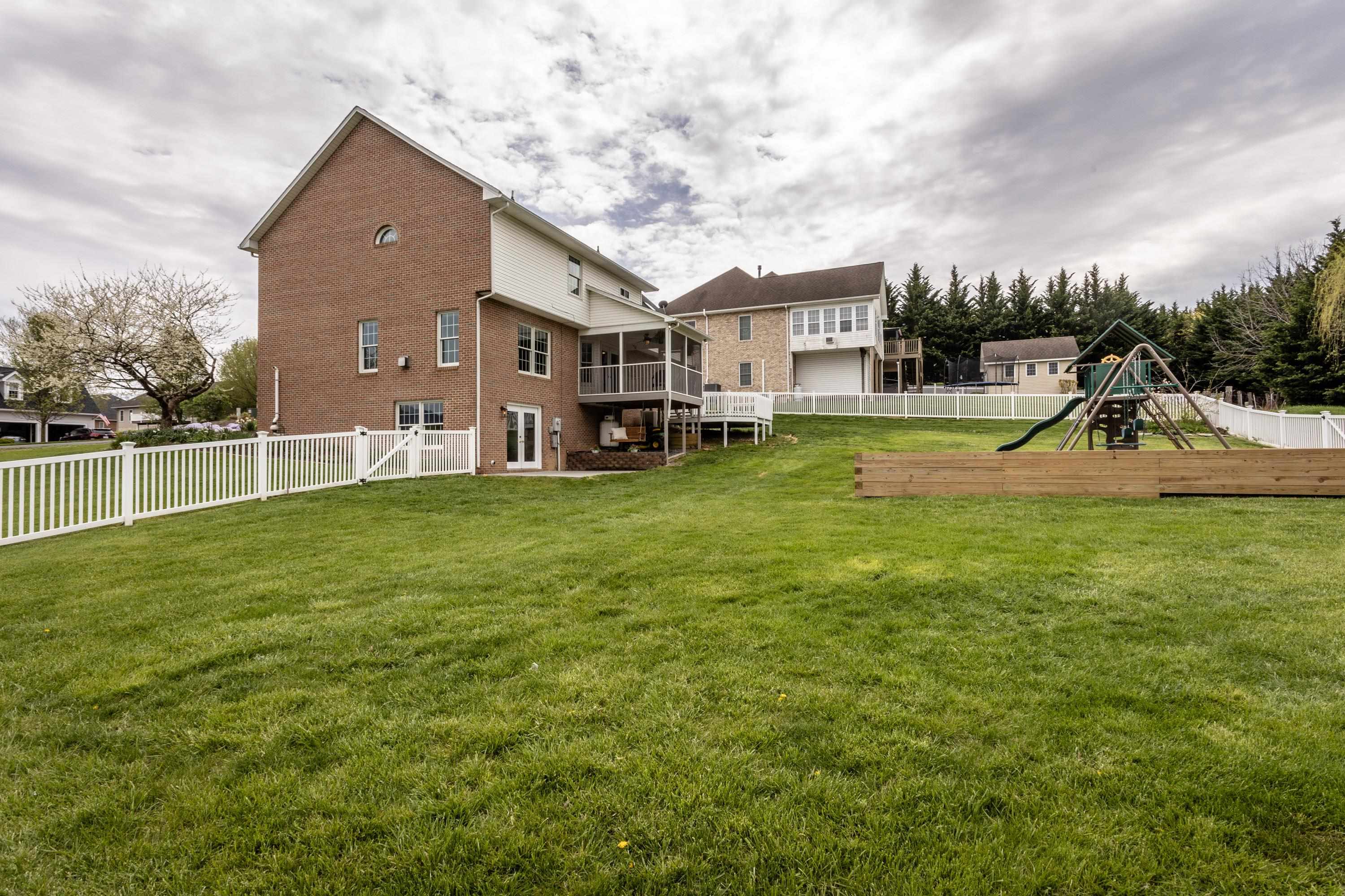 3850 Davis Road Penn Laird, VA 22846 - Photo 50 of 70 a view of a house with a big yard and sitting area