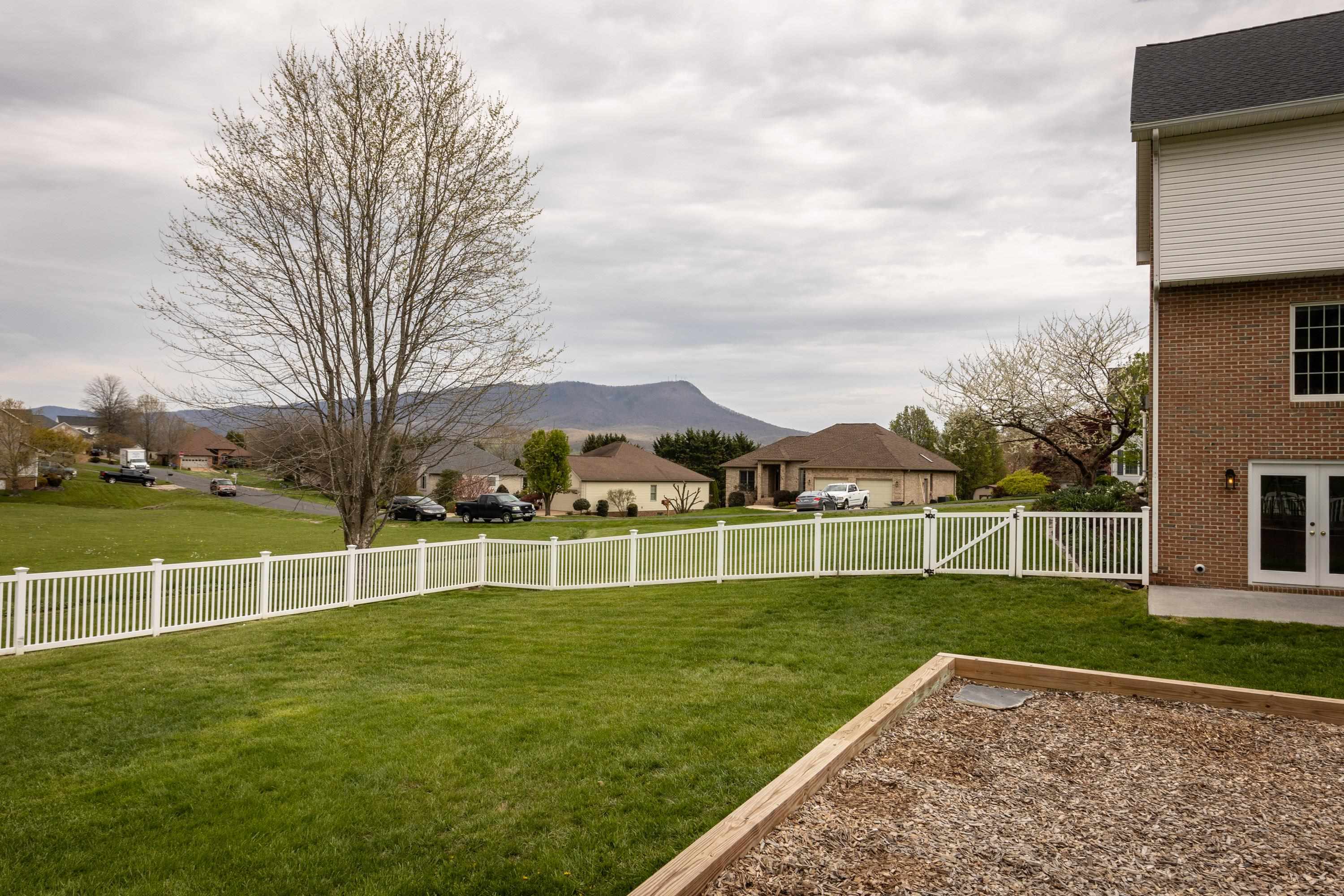 3850 Davis Road Penn Laird, VA 22846 - Photo 52 of 70 a view of a yard with a house in the background