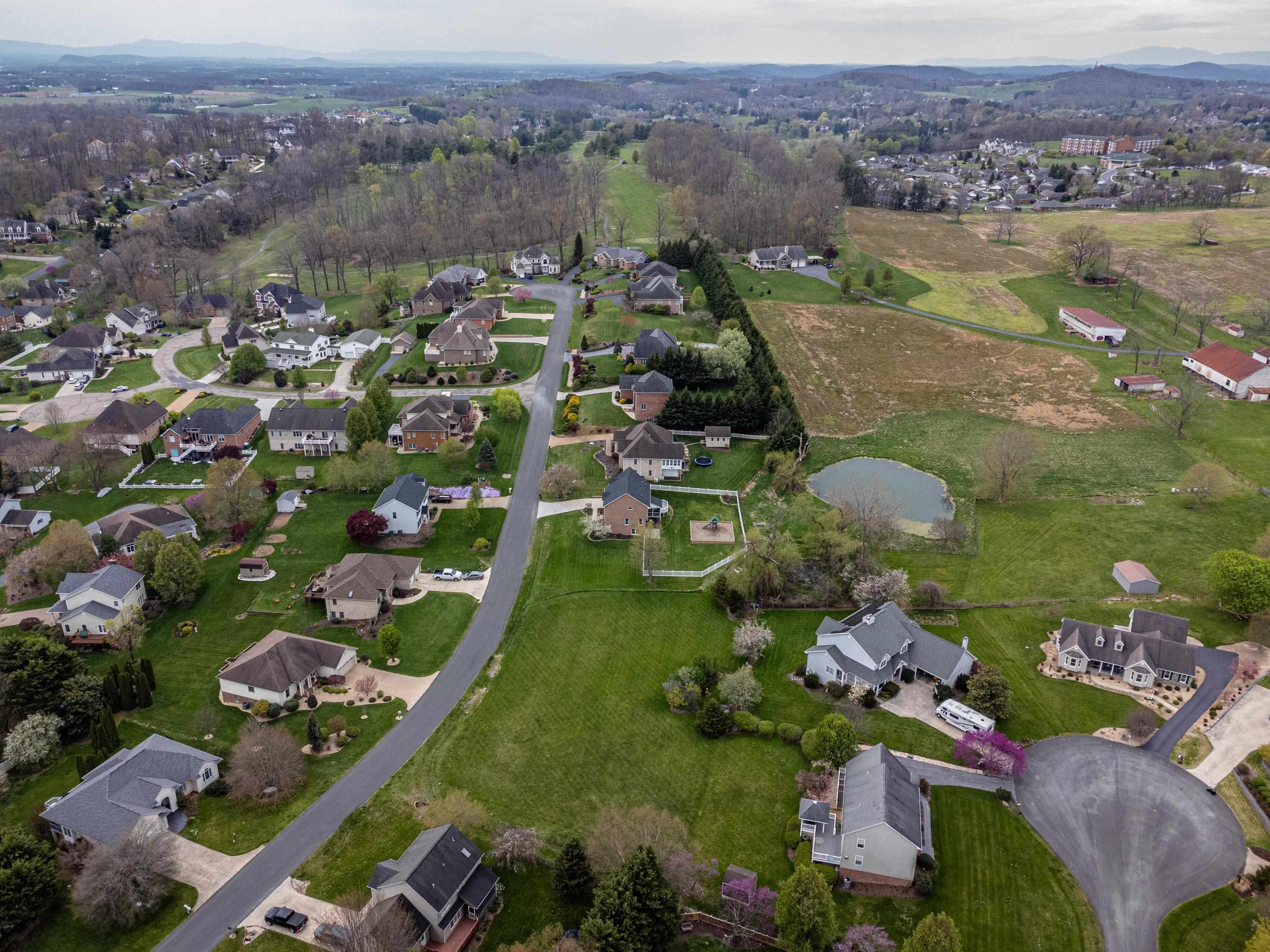 3850 Davis Road Penn Laird, VA 22846 - Photo 63 of 70 an aerial view of a houses with a lake