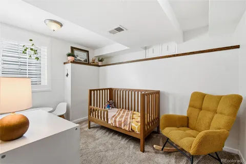 a bedroom with furniture and a couch