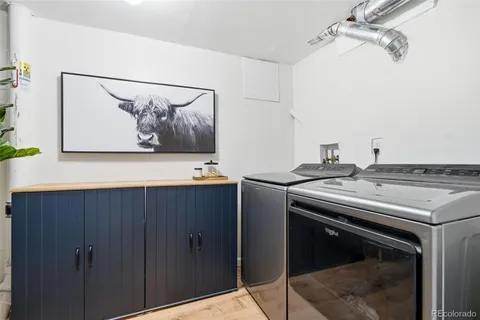 a stove top oven sitting inside of a kitchen