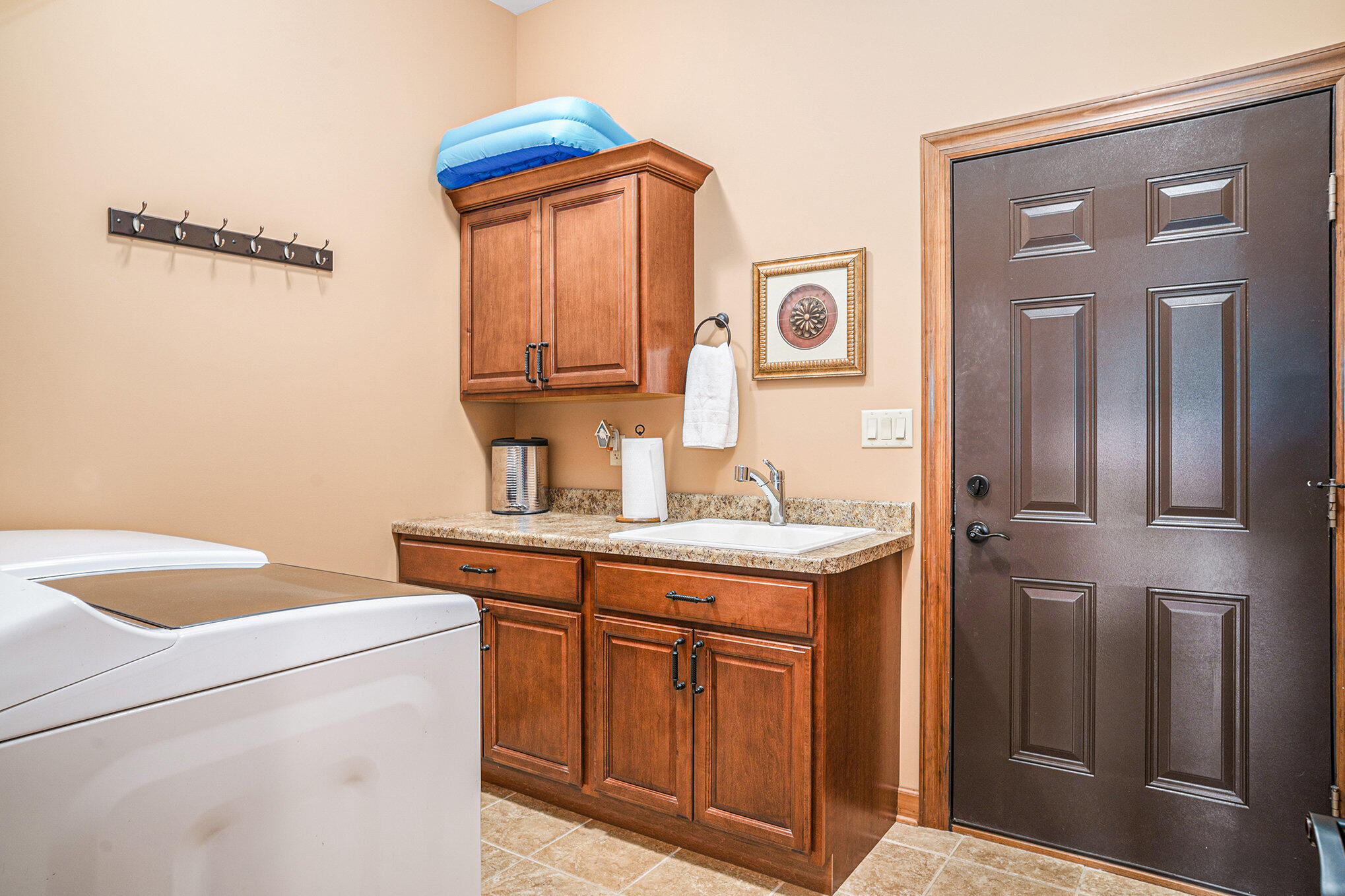 1244 Brandywine Road Crown Point, IN 46307 - Photo 23 of 42 a kitchen with stainless steel appliances granite countertop a sink and cabinets