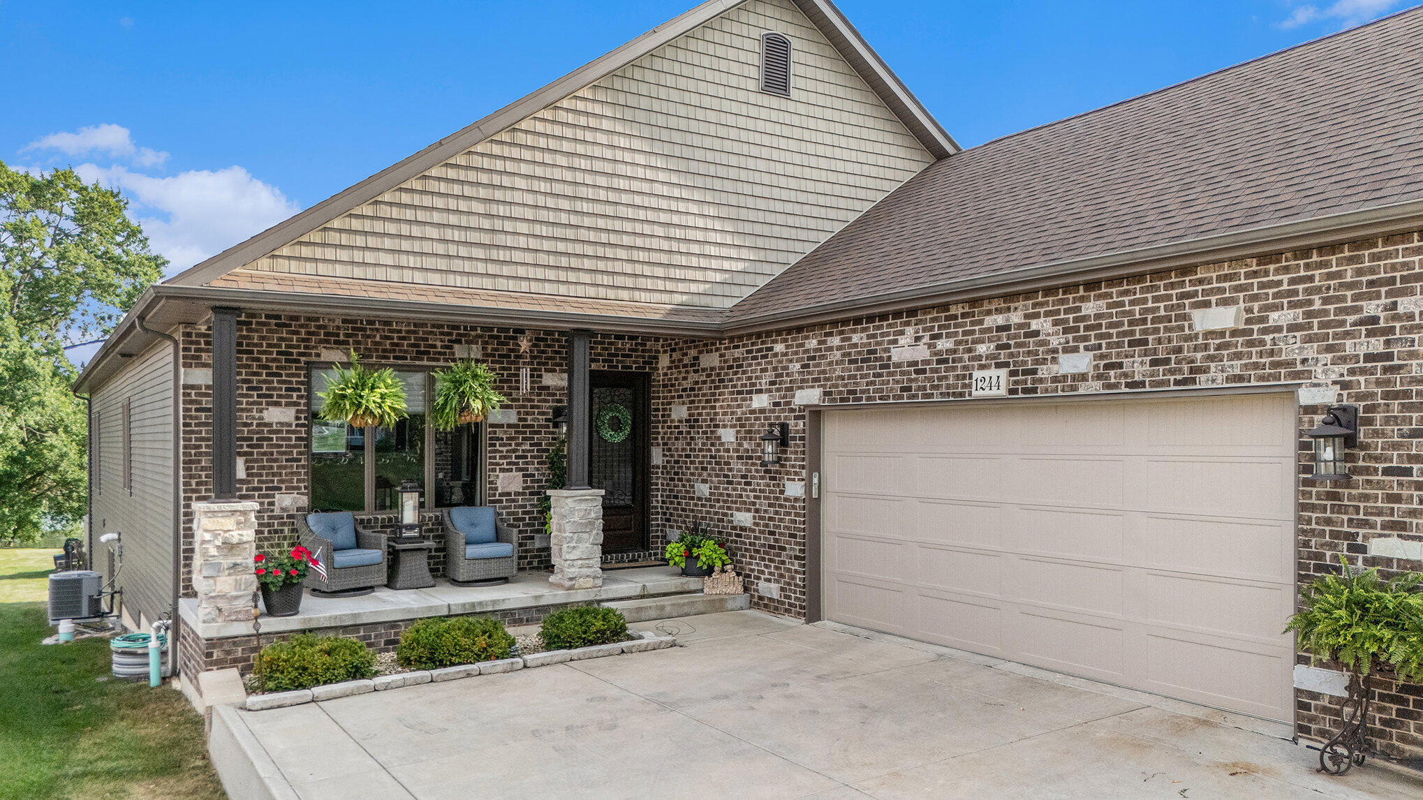 1244 Brandywine Road Crown Point, IN 46307 - Photo 6 of 42 a view of a house with porch and garden