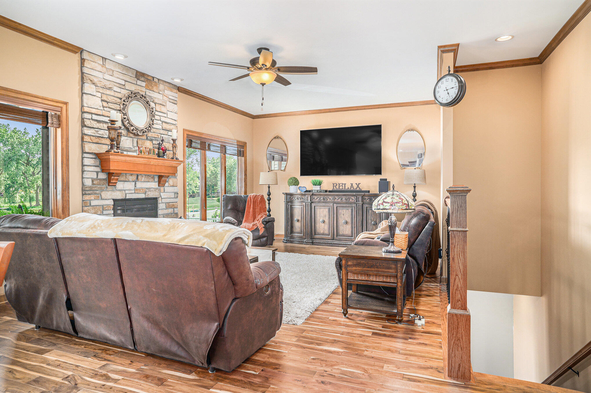 1244 Brandywine Road Crown Point, IN 46307 - Photo 9 of 42 a living room with furniture a flat screen tv and a window