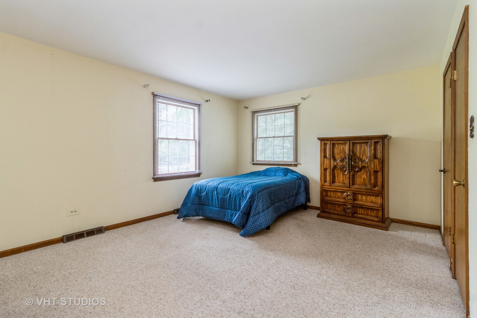 847 Highland Road Frankfort, IL 60423 - Photo 8 of 19 a bedroom with a bed and window