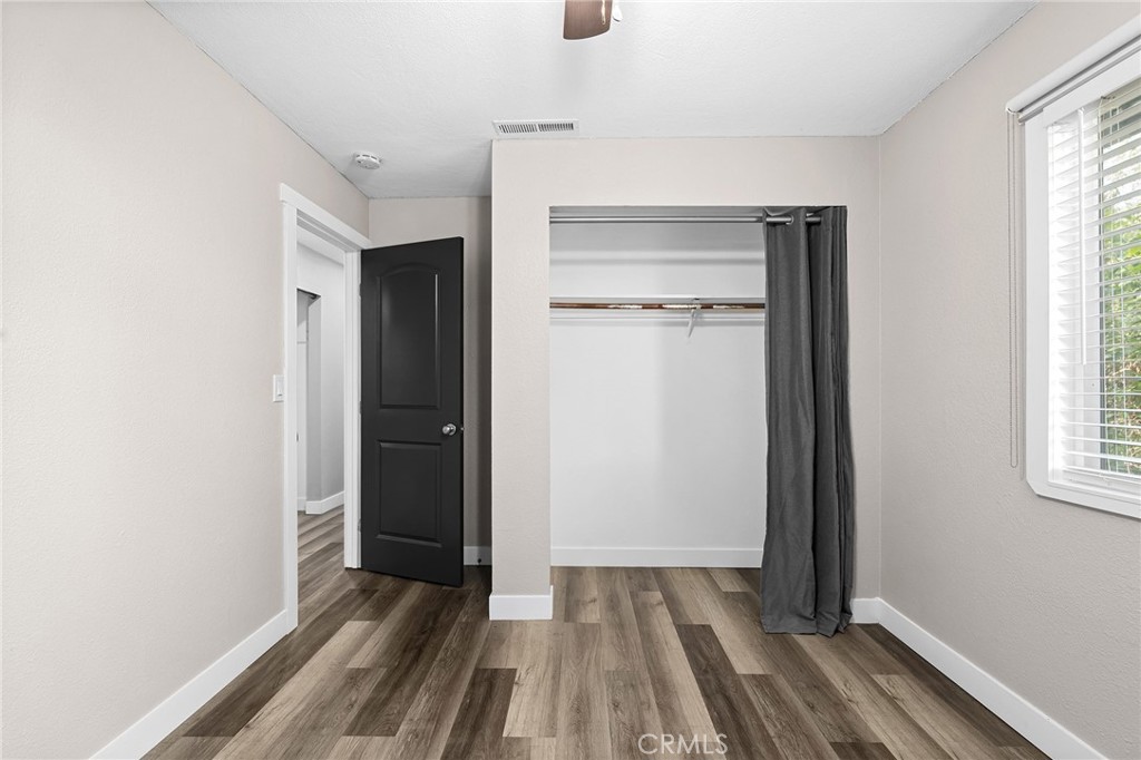 1131 Stewart Avenue Chico, CA 95926 - Photo 19 of 50 a view of a room with wooden floor and a window