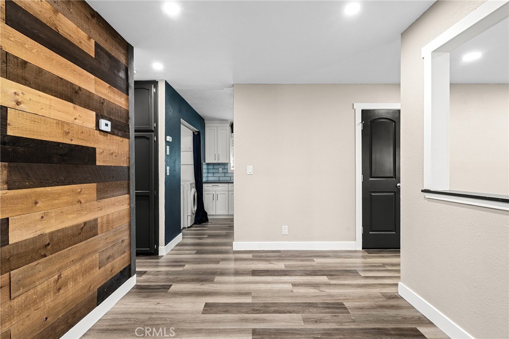 1131 Stewart Avenue Chico, CA 95926 - Photo 2 of 50 a view of a hallway with closet and mirror