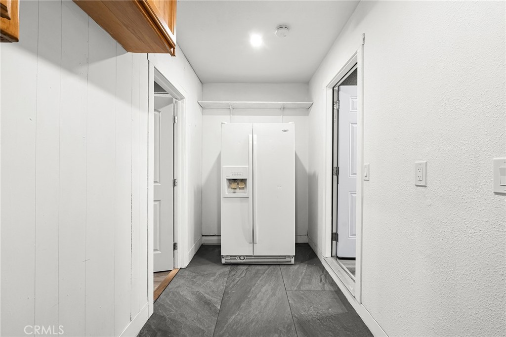 1131 Stewart Avenue Chico, CA 95926 - Photo 25 of 50 a view of a hallway with wooden floor