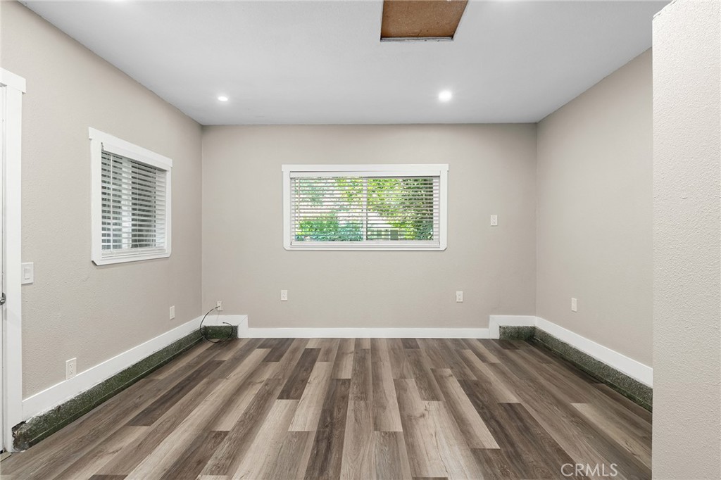 1131 Stewart Avenue Chico, CA 95926 - Photo 27 of 50 a view of a room with wooden floor and window