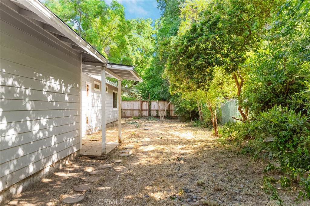 1131 Stewart Avenue Chico, CA 95926 - Photo 39 of 50 a view of a yard with a tree