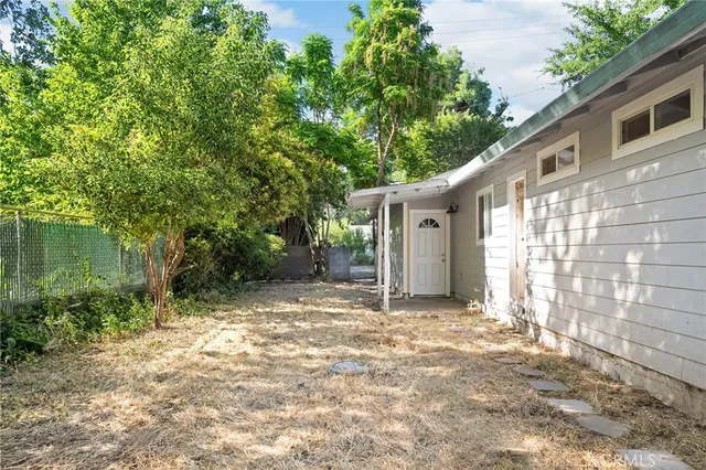 view of outdoor space with wooden fence