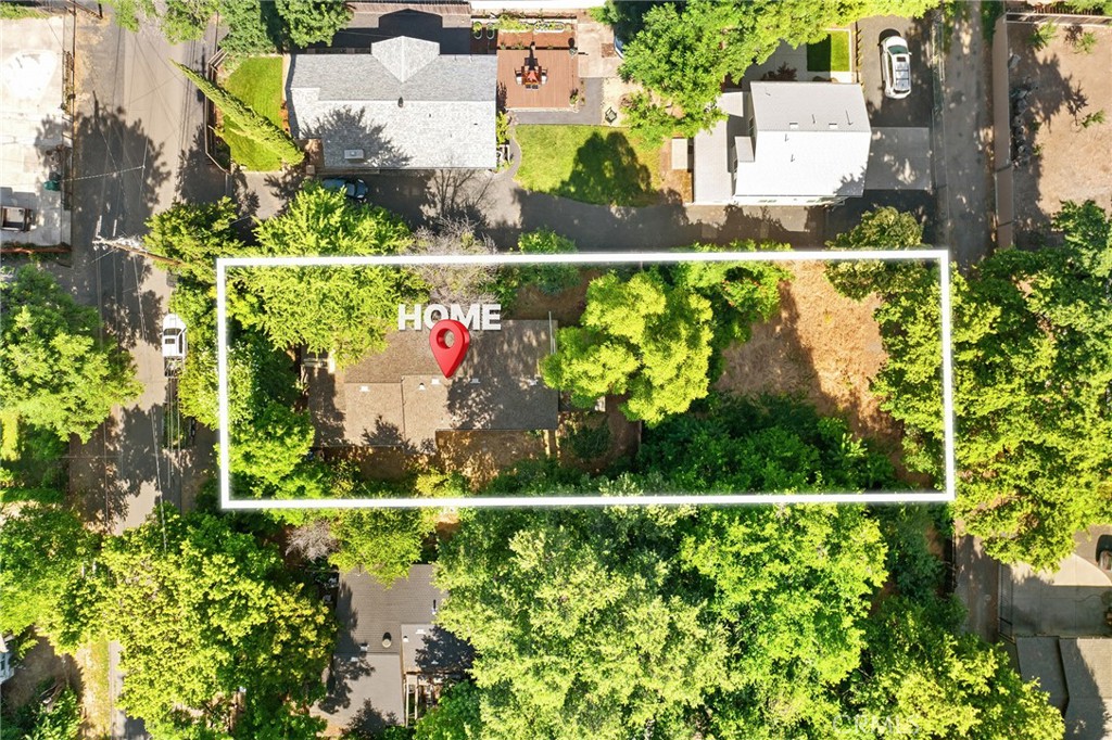 1131 Stewart Avenue Chico, CA 95926 - Photo 43 of 50 an aerial view of a houses with a yard and lake view