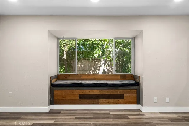 a room with a bed and a window