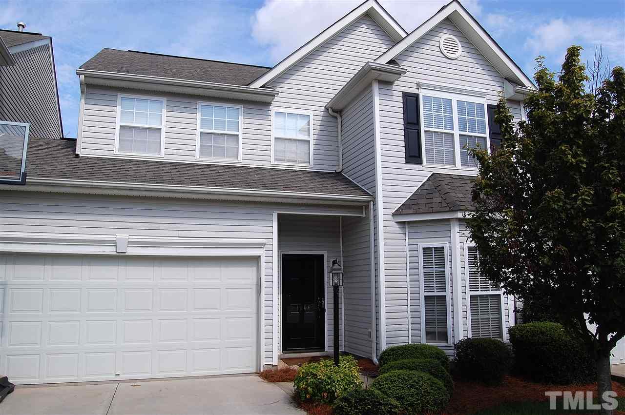 1108 Garnet Ridge Way Raleigh, NC 27607 - Photo 1 of 4 a front view of a house with garage