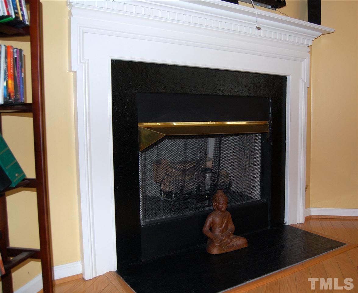 1108 Garnet Ridge Way Raleigh, NC 27607 - Photo 4 of 4 a living room with a fireplace