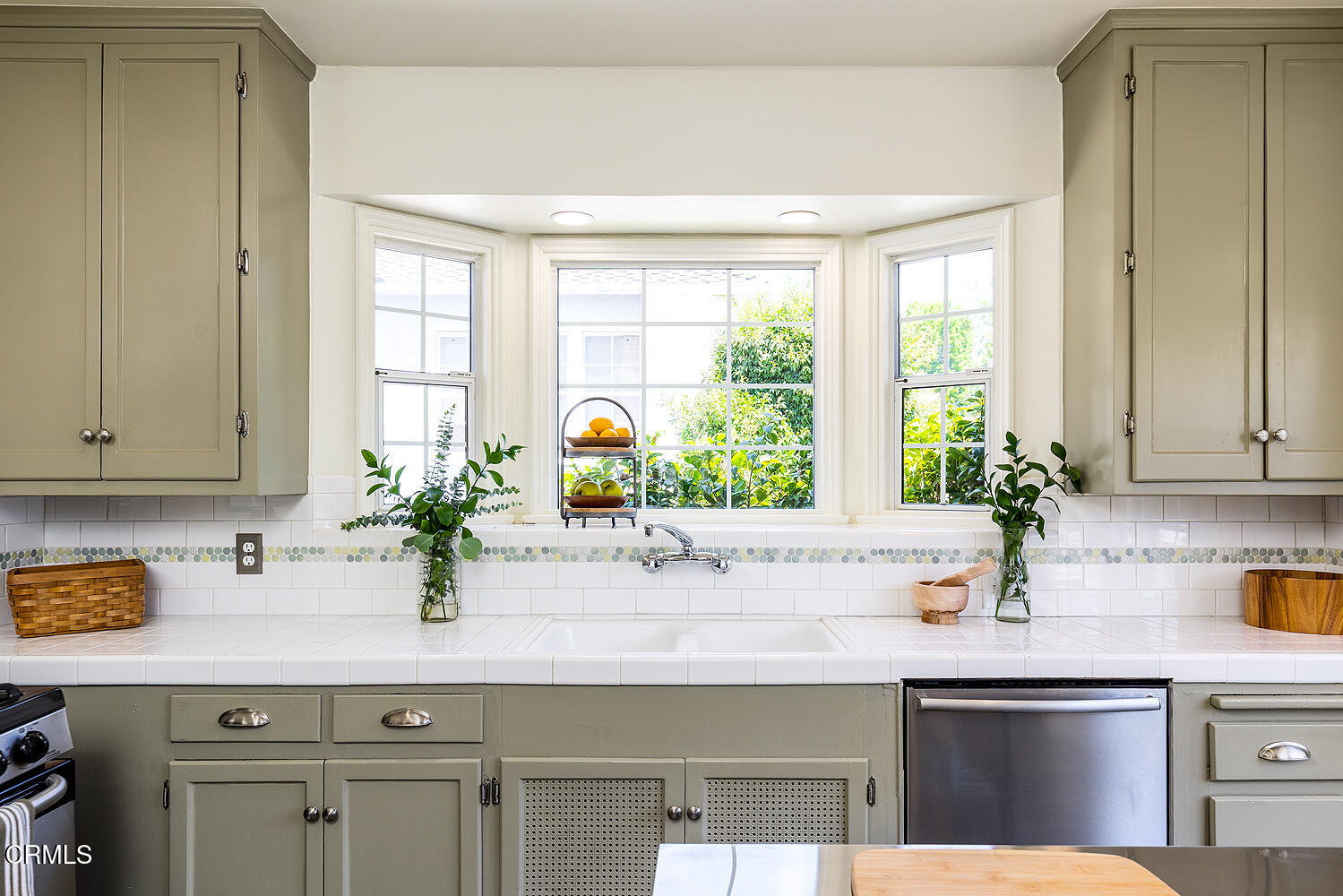 3255 Castera Avenue Glendale, CA 91208 - Photo 19 of 40 a kitchen with stainless steel appliances sink window and potted plant