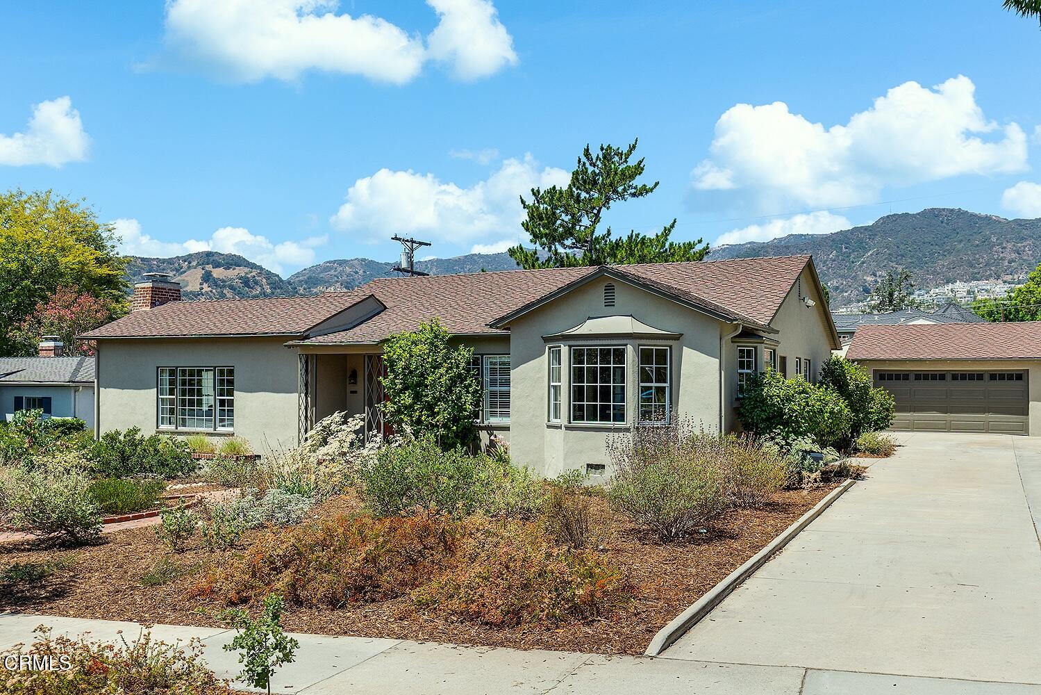 3255 Castera Avenue Glendale, CA 91208 - Photo 3 of 40 a front view of a house with a yard