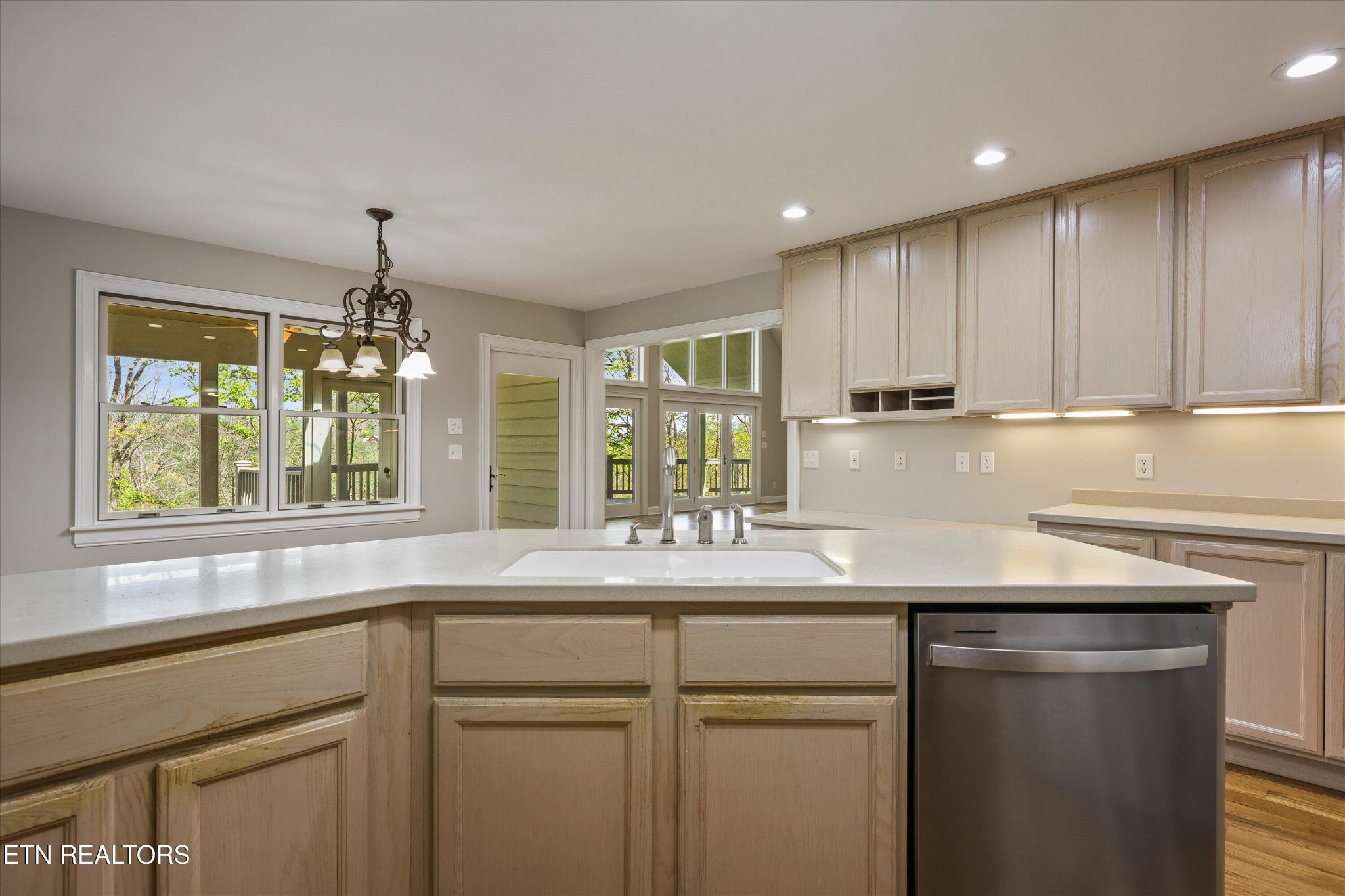 865 Stonegate Way Townsend, TN 37882 - Photo 25 of 60 a kitchen with kitchen island granite countertop a sink and a window